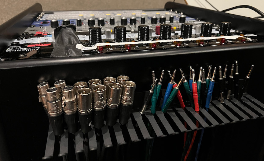 Top-view of preamp/patchbay rack showing the default/reset condition with all the patch cables put away in the holders and nothing plugged into the front of any patch bay.
