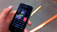 an iPhone records the sound and video of two metal pipes being banged together.